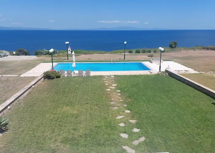 Blue Pastel-cliffside Villa, Shared Pool, Wild Sandy Nearby